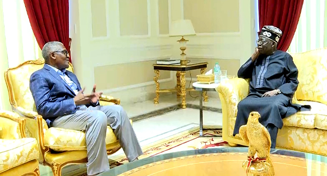Dangote (L) visited Tinubu (R) shortly after the President returned from a state visit to the United Kingdom.