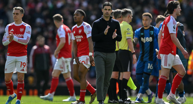 Arsenal’s Spanish manager Mikel Arteta (C) claps at the end of the English Premier League football match between Arsenal and Bournemouth at the Emirates Stadium in London on April 11, 2026. (Photo by Glyn KIRK / AFP)