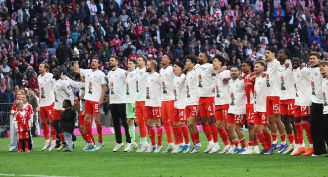 FC Bayern Munich’s team celebrates after winning the German first division Bundesliga football match between FC Bayern Munich and VfB Stuttgart, as well as the Bundesliga title in Munich, southern Germany, on April 19, 2026. Photo by KARL-JOSEF HILDENBRAND / AFP