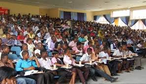 UNIVERSITY STUDENTS IN A LECTURE HALL