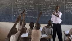 A Jigawa State teacher and his students in class