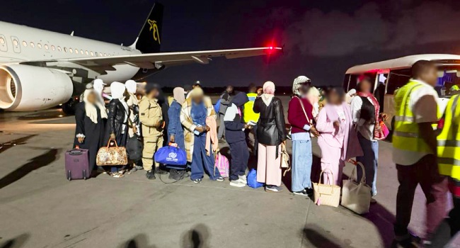 "the evacuation is part of efforts to address" The IOM says irregular migration and support vulnerable returnees.