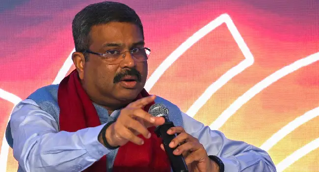 India’s Education Minister Dharmendra Pradhan addresses the gathering on the second day of the three-day B20 Summit in New Delhi on August 26, 2023. Photo by ARUN SANKAR / AFP