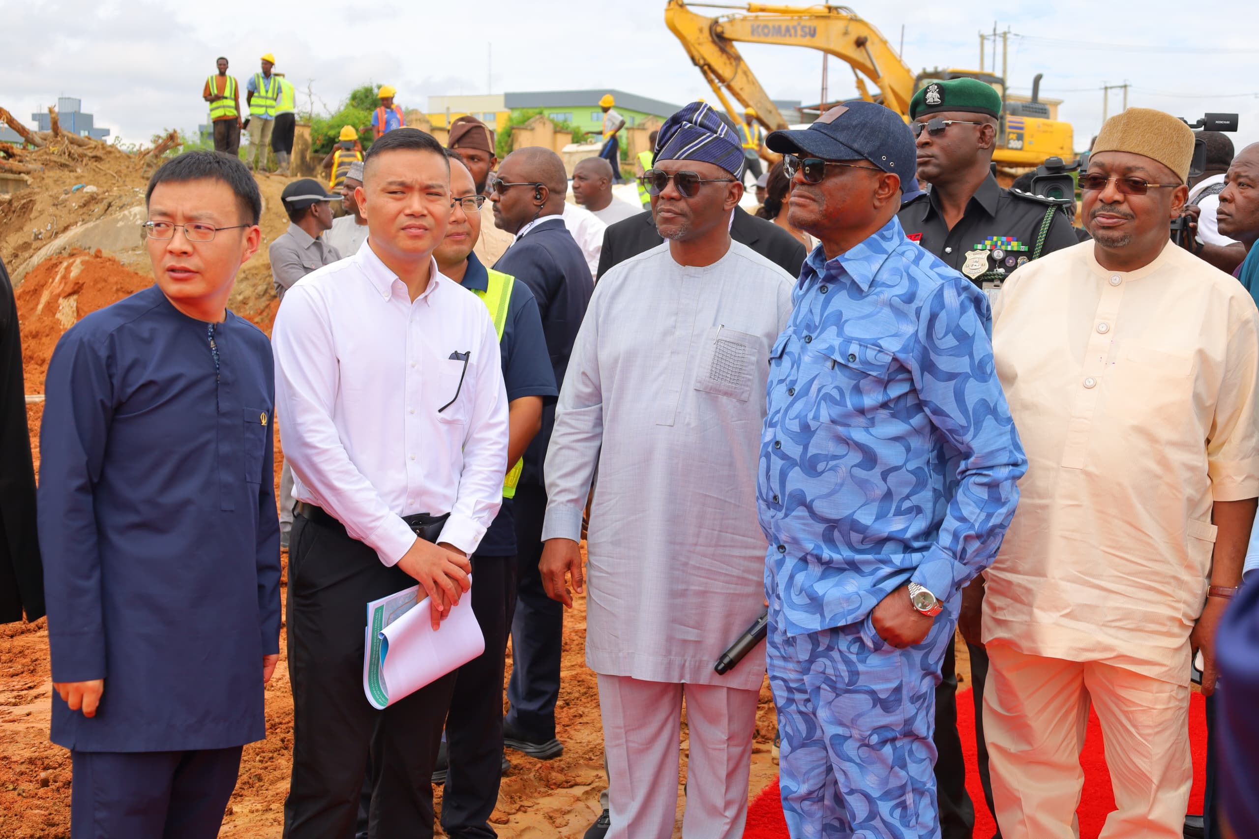R-L Senator Philip Aduda, FCT Minister, Nyesom Wike, Executive Secretary, FCDA, Engr Richard Yunana Dauda, Executive Director, CCECC Nig Ltd, Henry Shao and Executive Managing Director, CCECC Nig Ltd, Ren Shaoshuai during the Minister's inspection of ongoing extension of the Access Road from Nile University to RR3 in Abuja on Monday